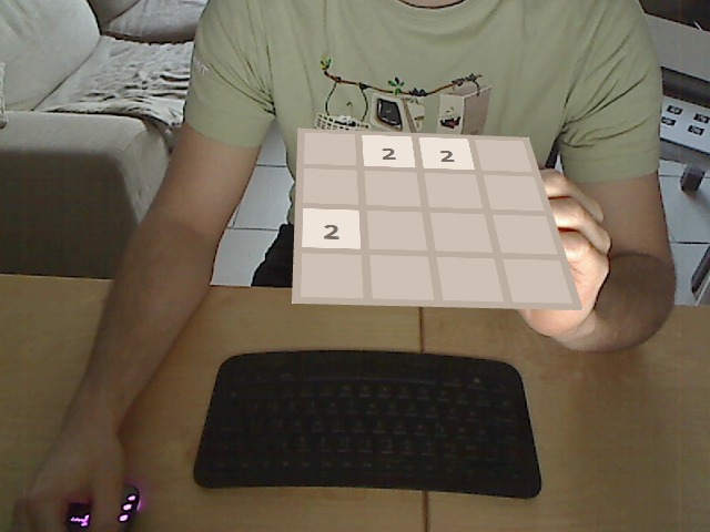 Tilt the tag/game up to send the number tiles up